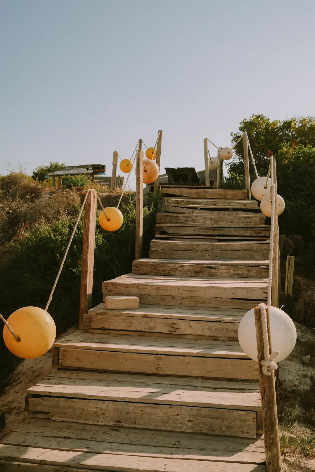 Rope handrails and buoys along the timber boardwalk